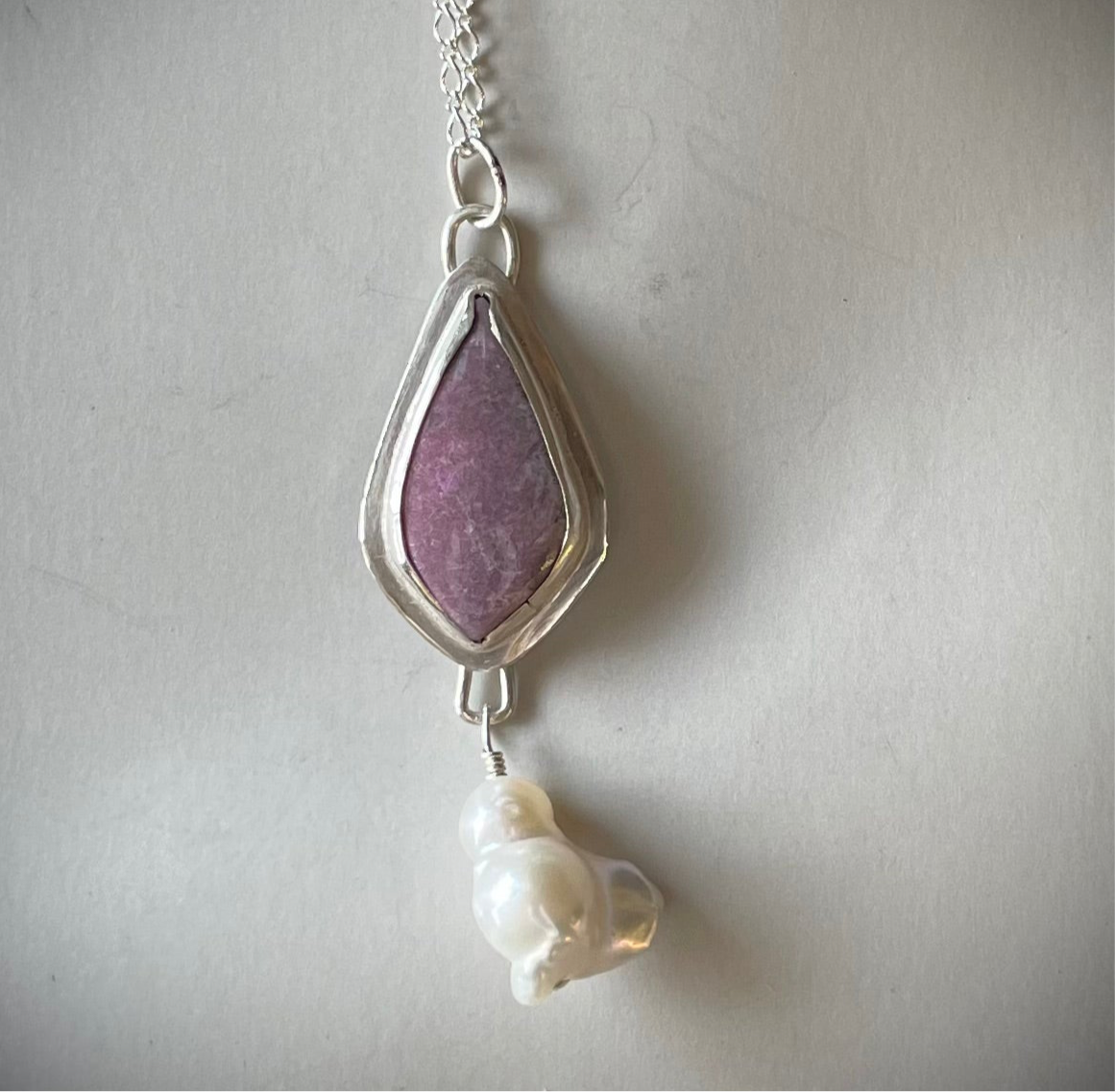 Thulite stone set in sterling silver with a bird shaped cultured pearl