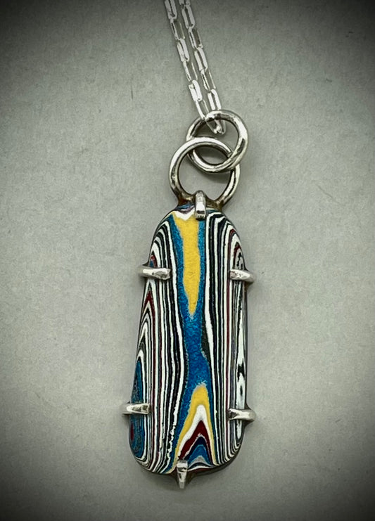 Fordite pendant