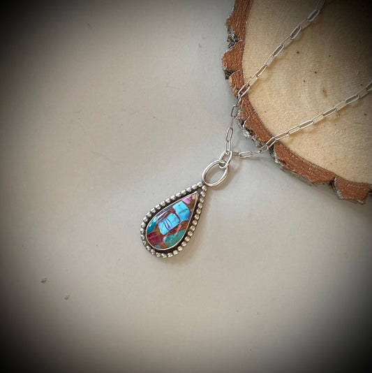 Composite turquoise with bead wire accent set in sterling silver